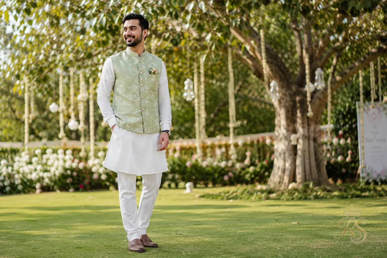 Groom wearing a short casual Nehru jacket over a kurta for a daytime function