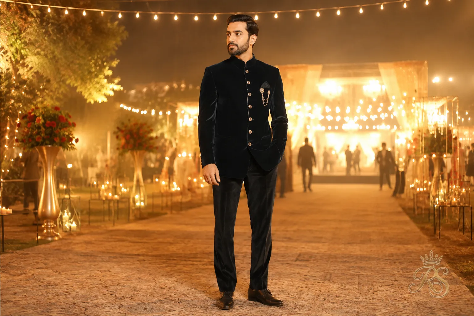 Groom wearing a rich velvet bandhgala jacket for a winter evening wedding