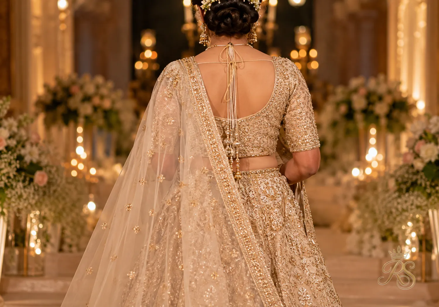 Back view of a bride showing the pallu of her dupatta flowing down her back