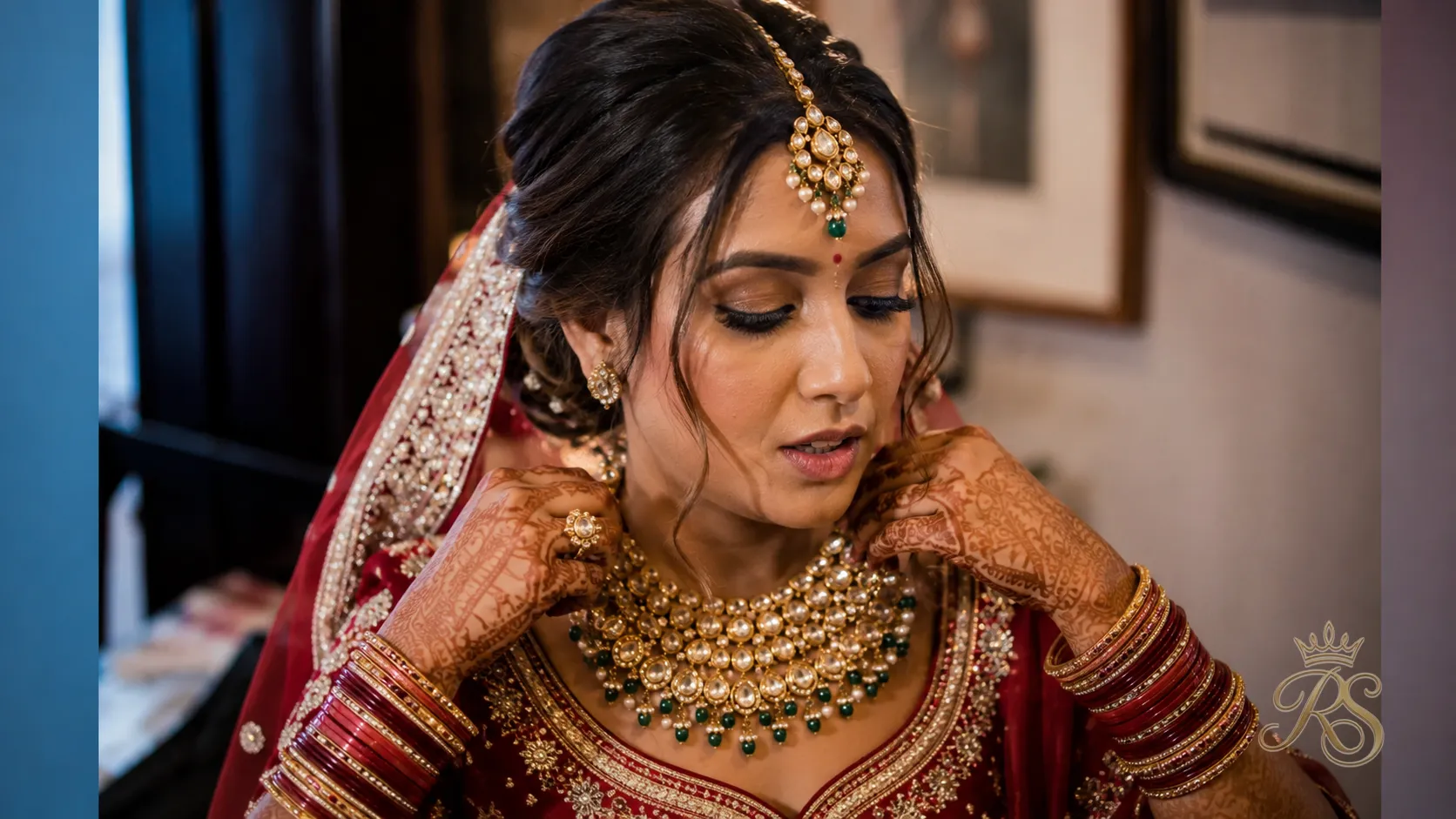 Bride adjusting a heavy bridal necklace that appears uncomfortable, illustrating a common jewellery fitting mistake