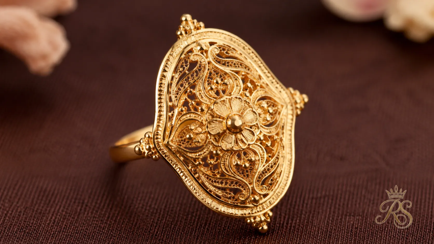 Bengali gold filigree bridal ring with delicate traditional engraving
