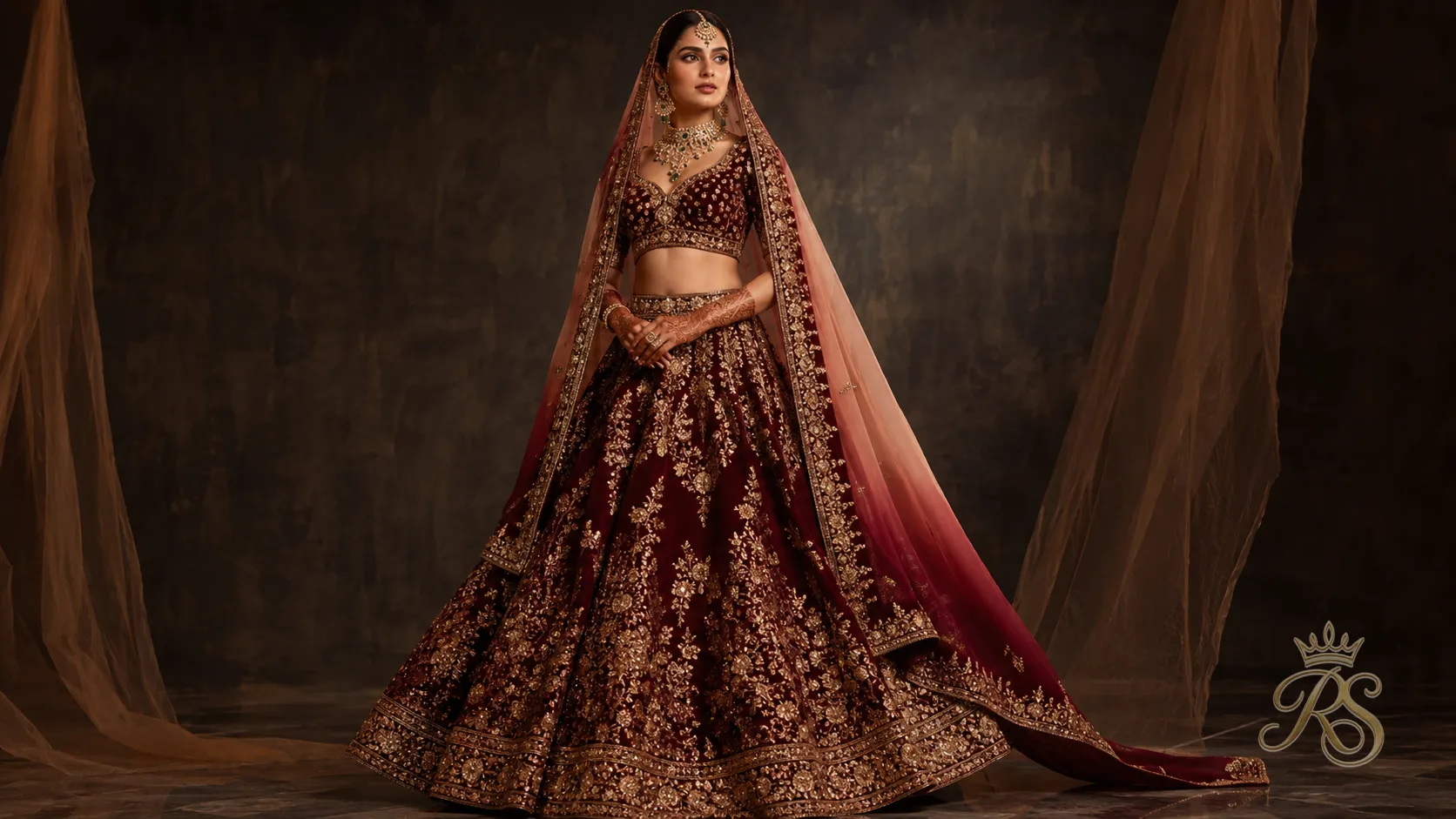 Manish Malhotra style bridal lehenga in deep maroon with ombre dupatta