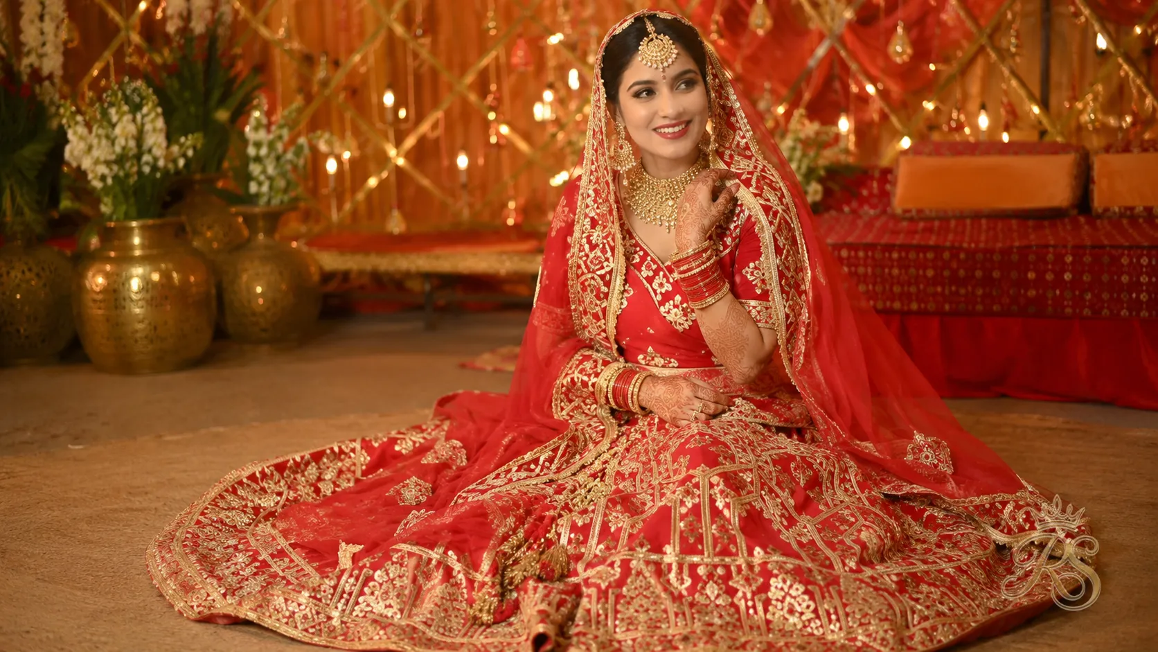 Punjabi bridal lehenga in rich red with heavy gota patti embroidery