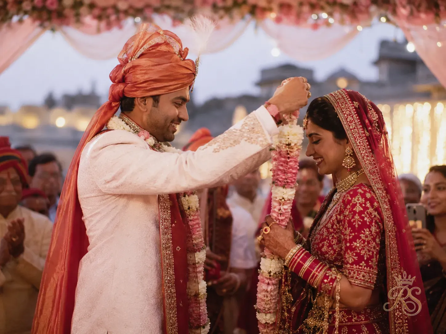 Emotional candid moment of bride and groom exchanging garlands at a Rajasthan wedding