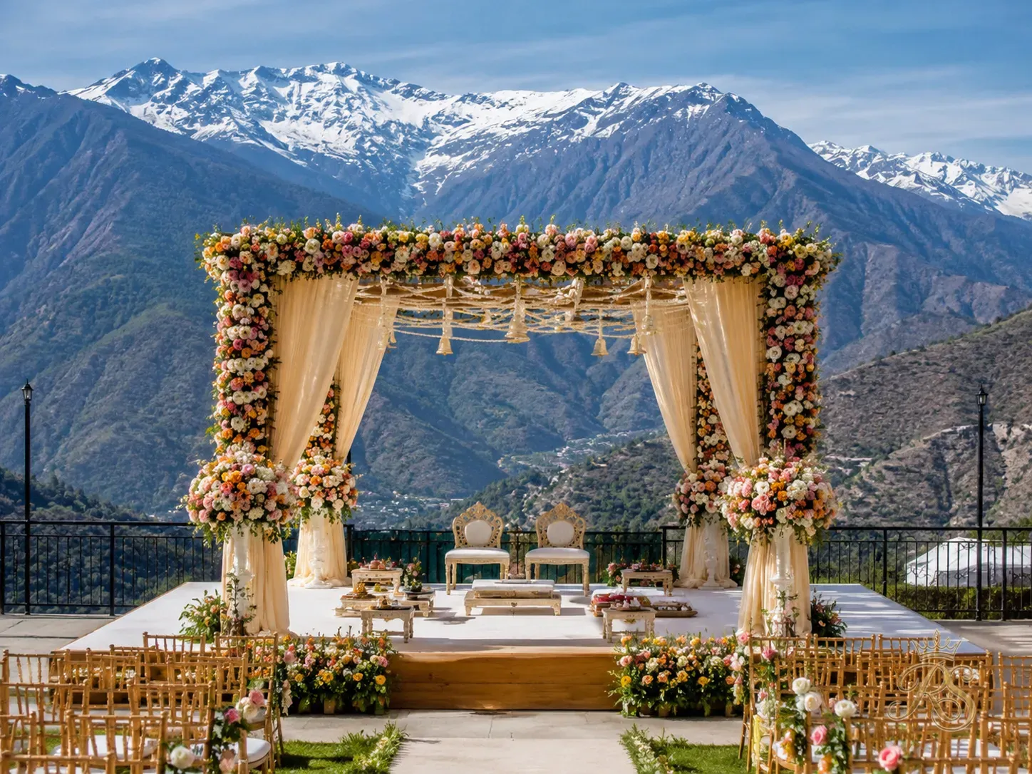 Wedding mandap set up against Himalayan mountain backdrop in Himachal Pradesh