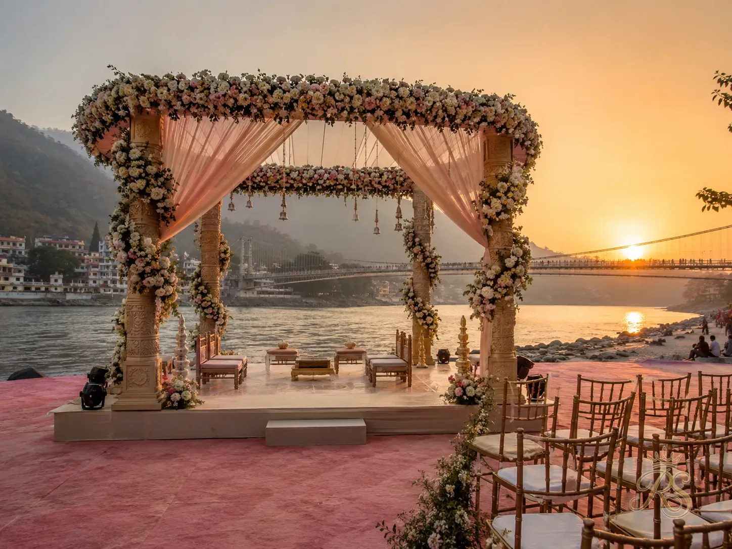 Outdoor wedding mandap on the banks of the Ganges in Rishikesh at sunset