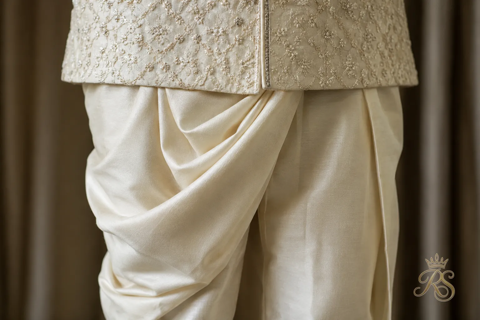 Detail shot of dhoti pants drape and jacket pairing worn for a sangeet look