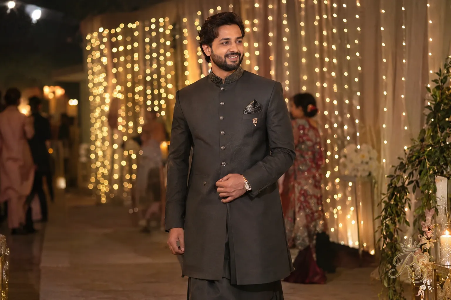 Groom wearing a fitted Indo-Western bandhgala jacket over a kurta at a sangeet function