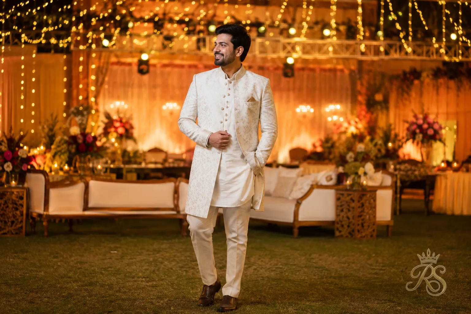 Groom wearing a lightweight unlined sherwani-lite jacket for a sangeet celebration