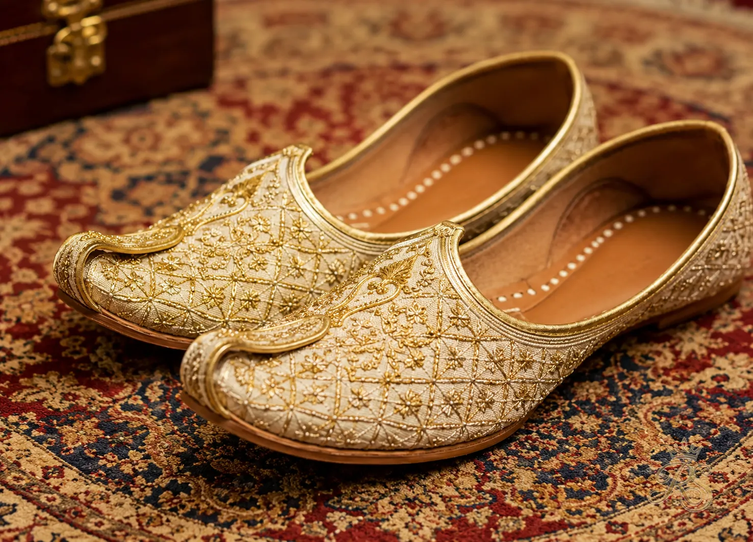 Traditional embroidered mojari shoes for the groom's wedding day outfit