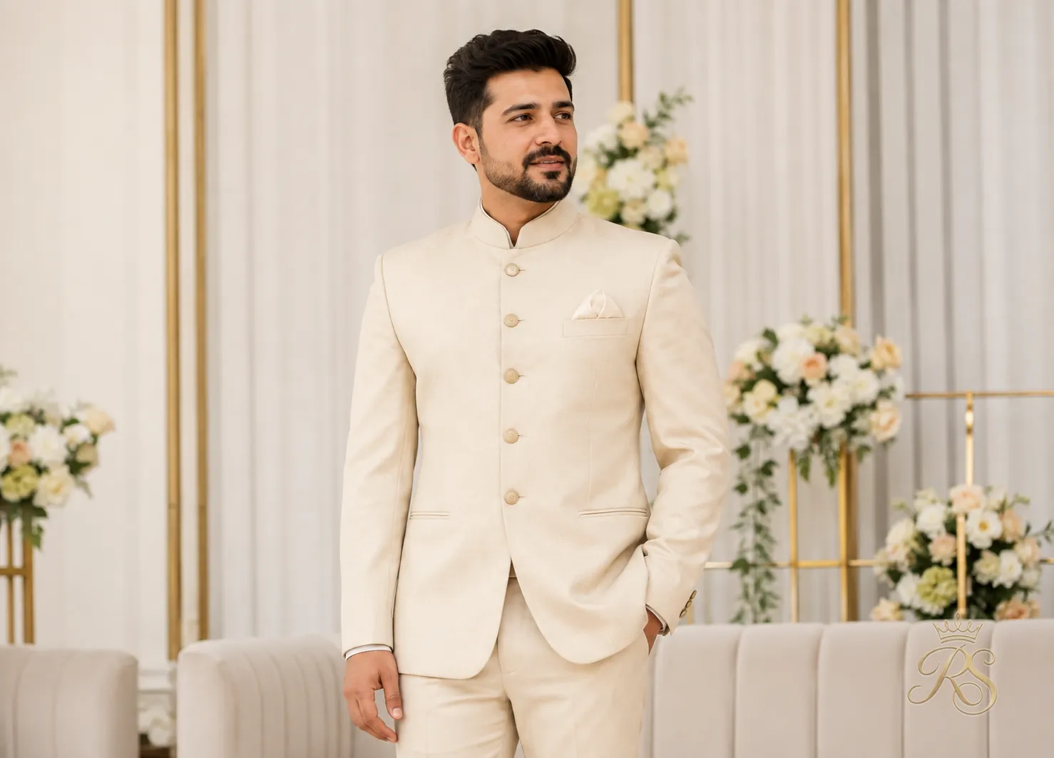 Groom in a structured Nehru jacket and trousers set at a wedding function