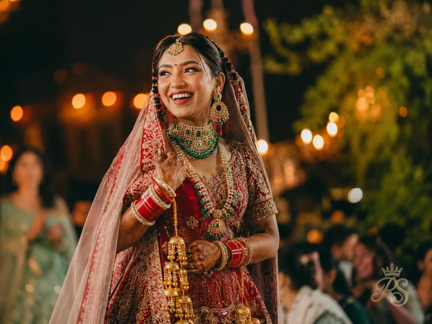 Bride in a trending bridal lehenga design smiling candidly during her wedding celebration