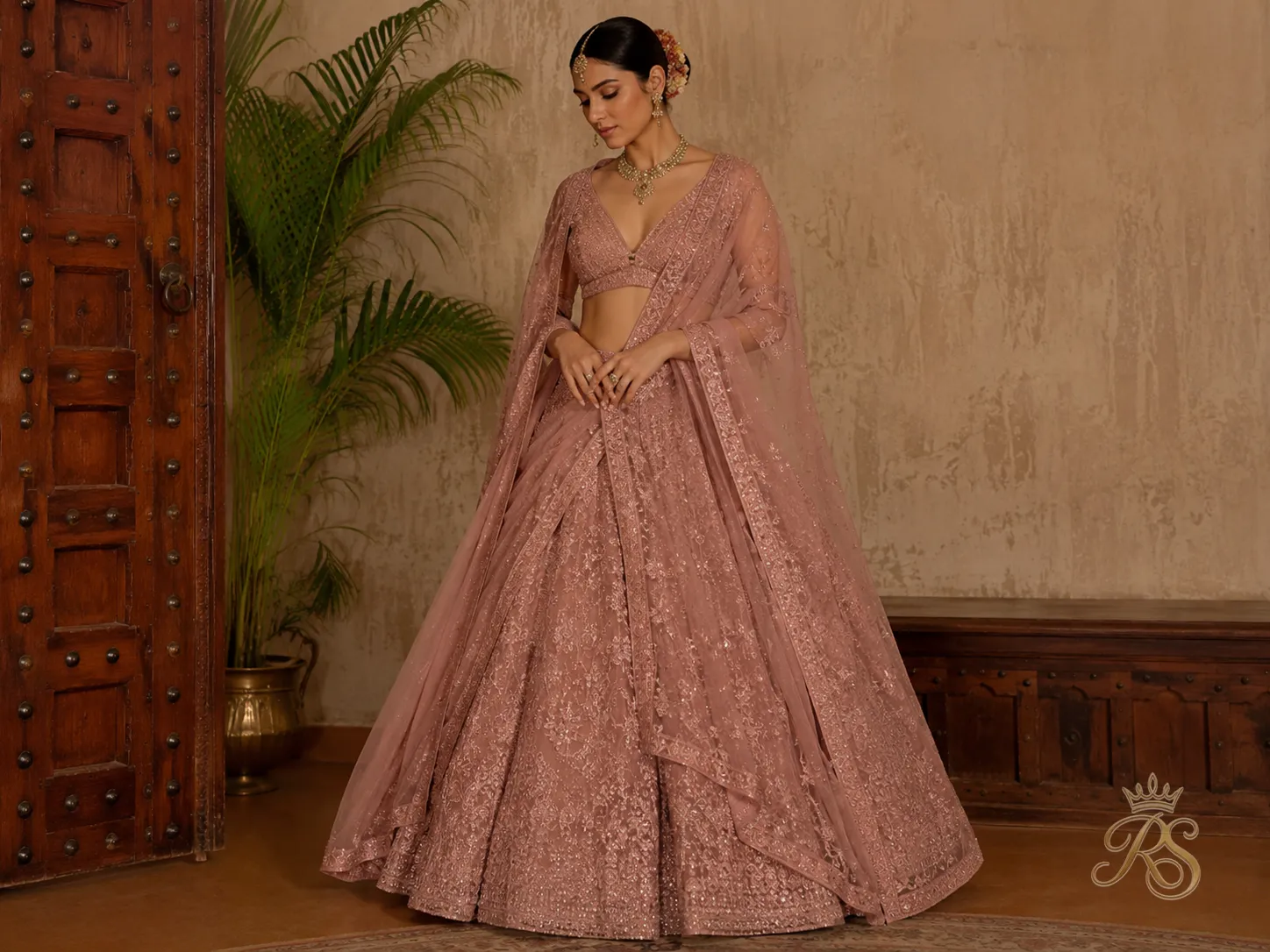 Dusty rose bridal lehenga with tone-on-tone embroidery