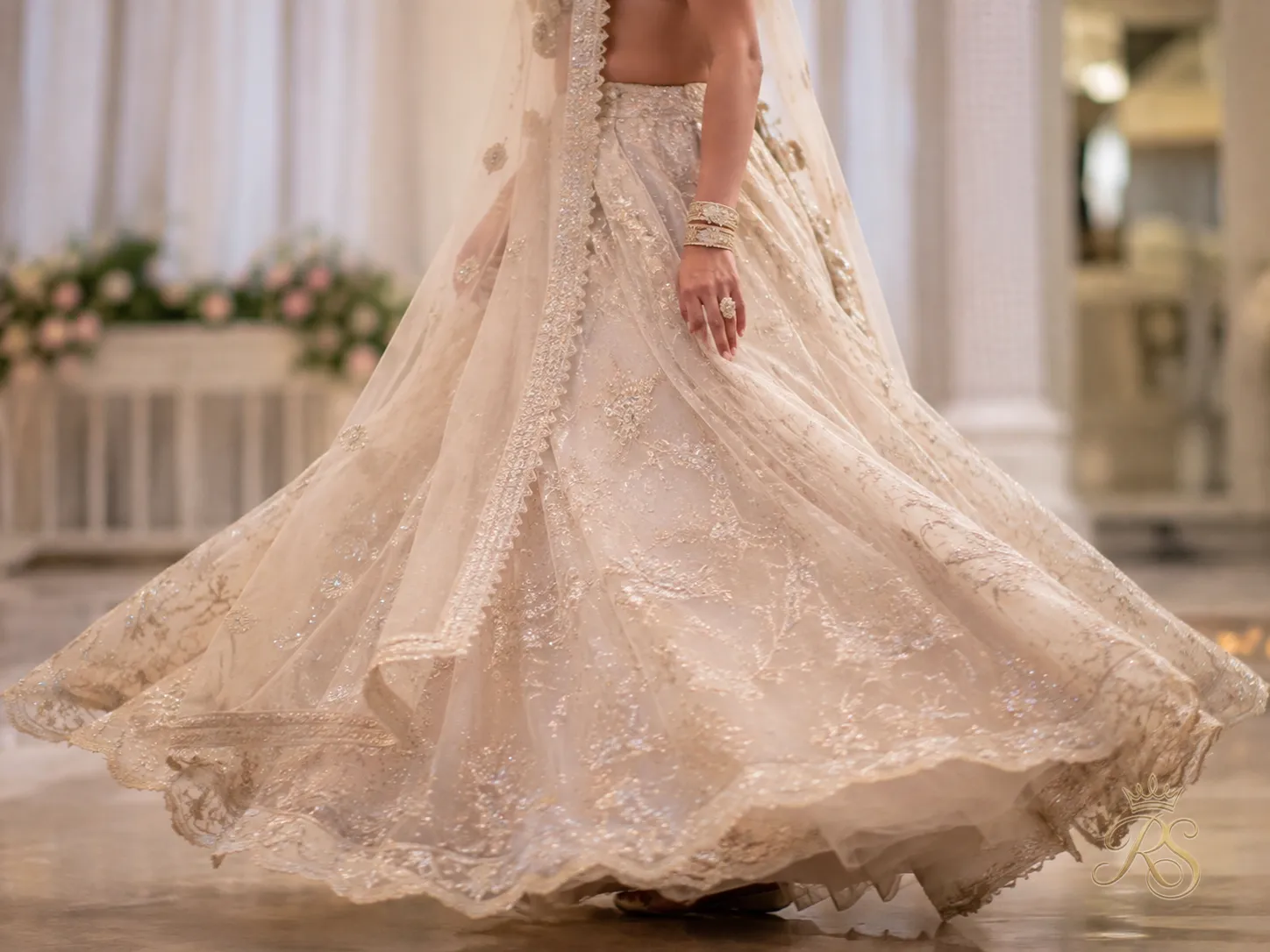 Lightweight organza bridal lehenga fabric in motion during a bridal walk