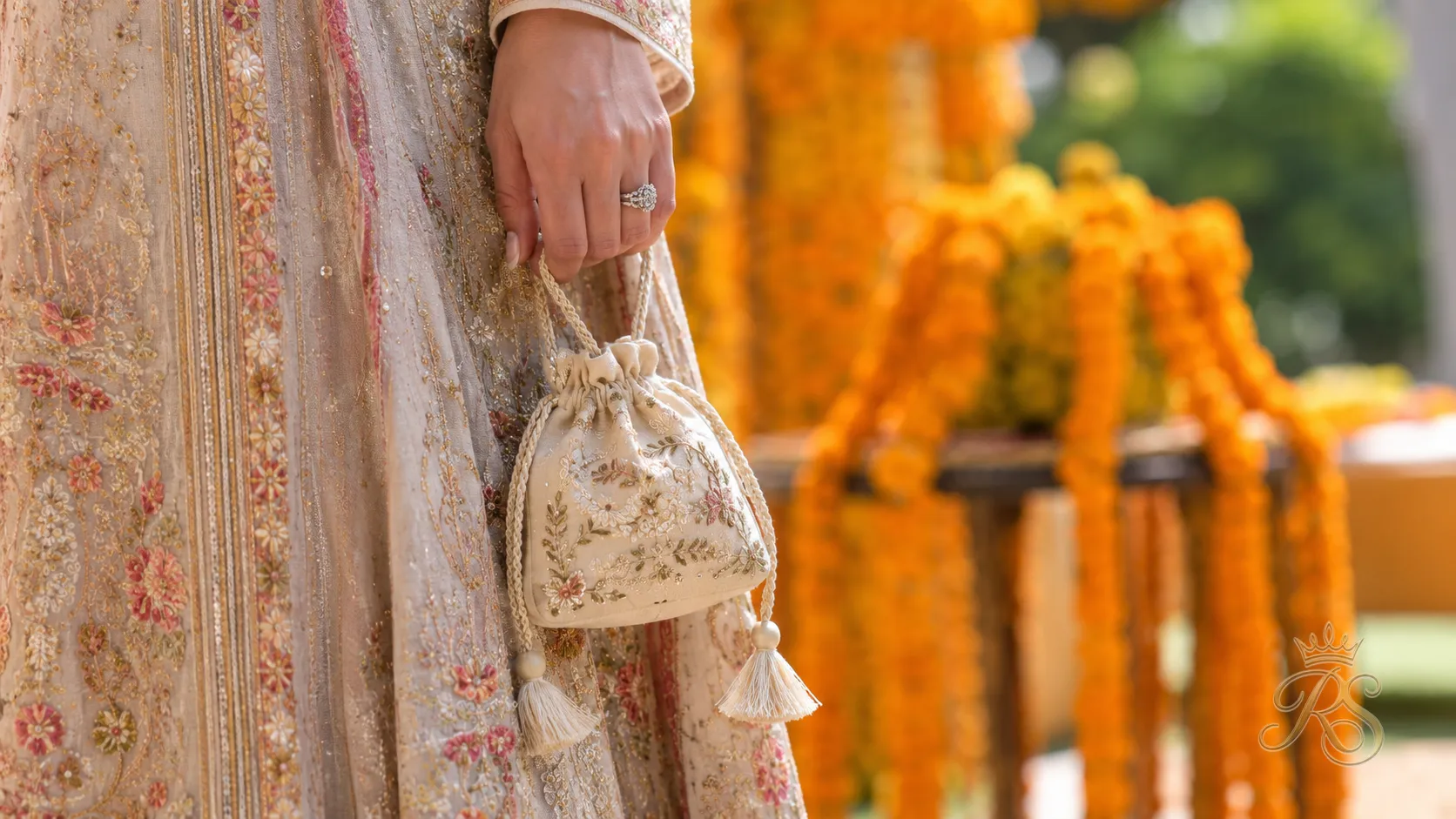 Embroidered boho mini pouch bag with tassel drawstring for mehendi