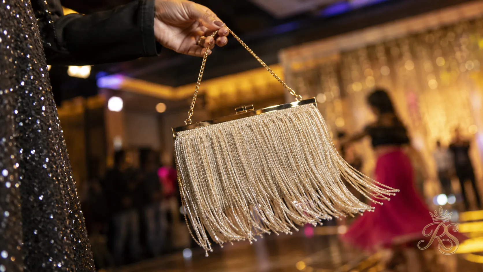 Fringe tassel clutch bag swinging with movement for sangeet