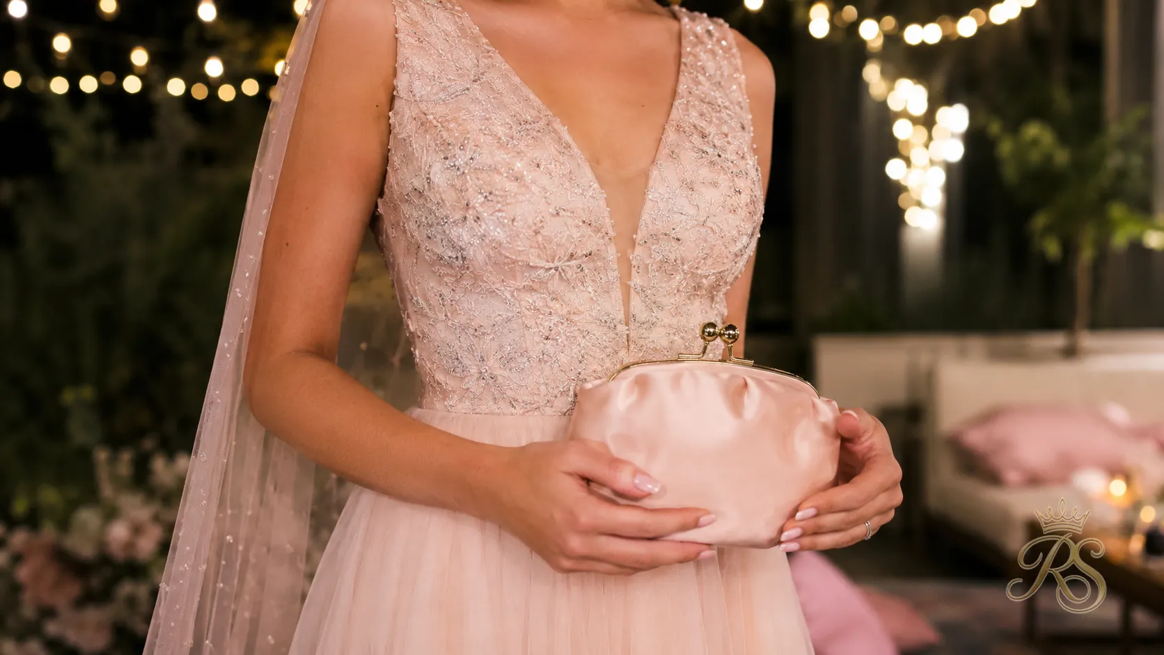 Pastel satin mini bag for a bridal reception outfit