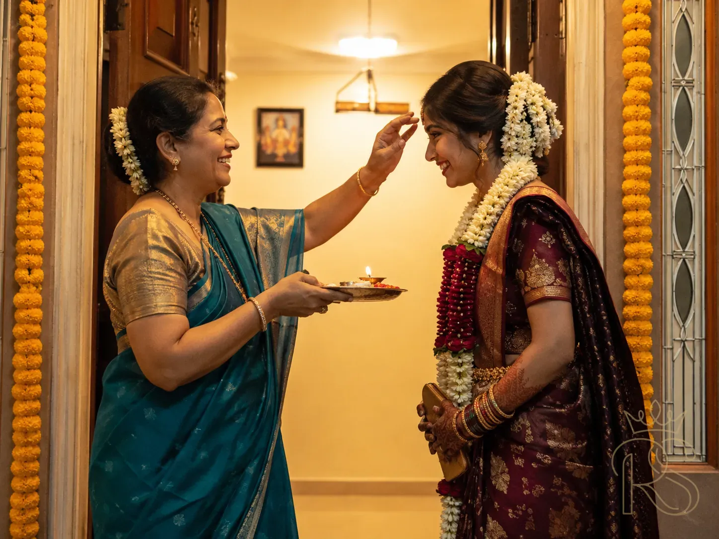 Mother's Aarti Welcome at the Doorway