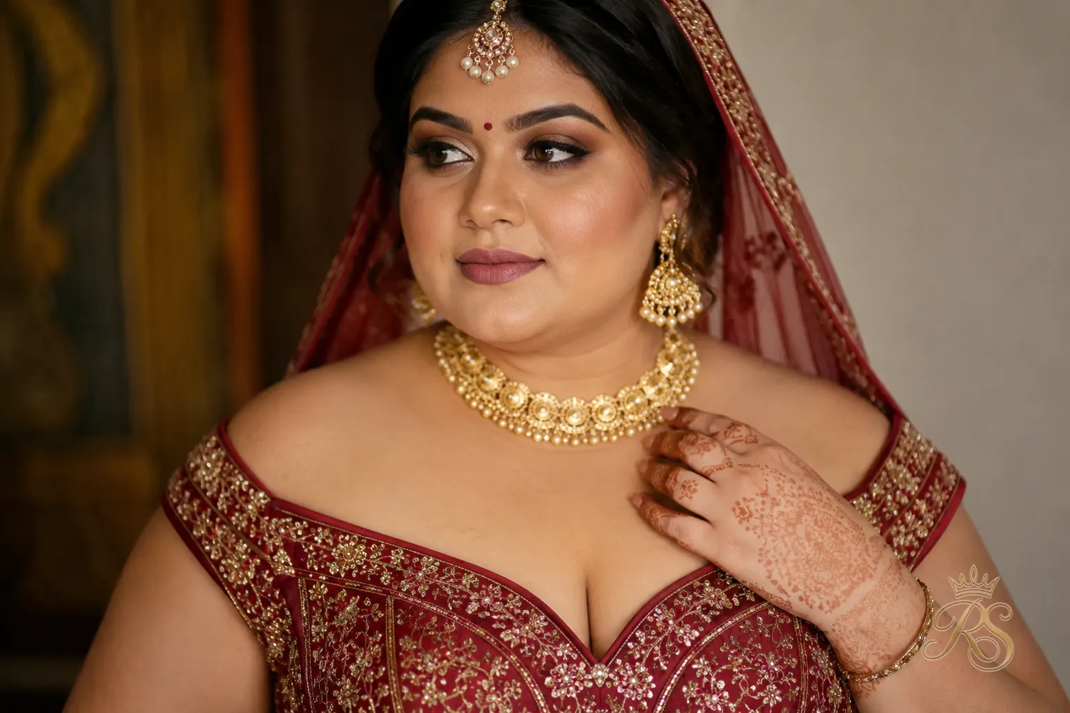 Plus size bride in an off-shoulder bridal blouse with structured boning