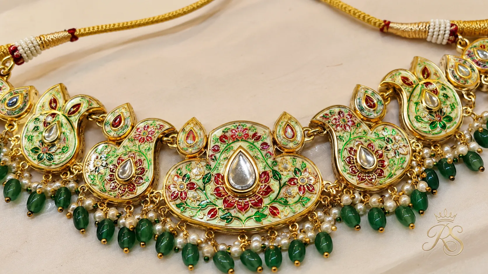 Reverse side of a kundan necklace showing detailed meenakari enamel work