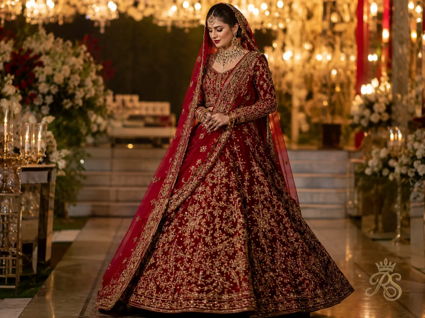 Red velvet bridal lehenga with heavy zardozi embroidery in gold thread