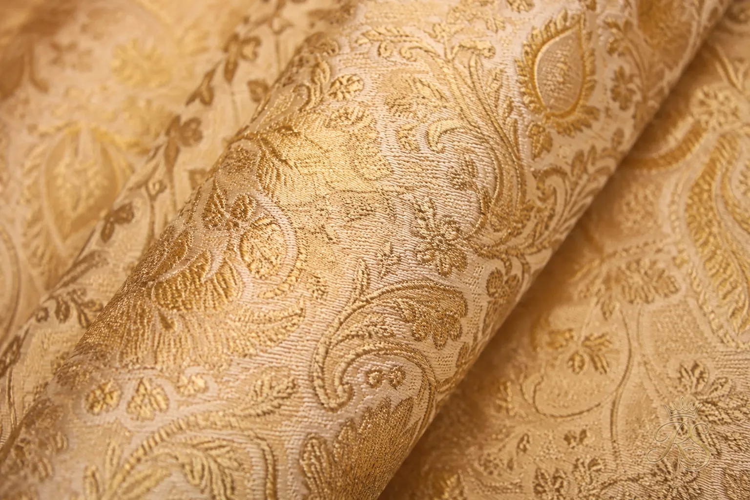 Detailed brocade fabric texture used in groom sherwani design